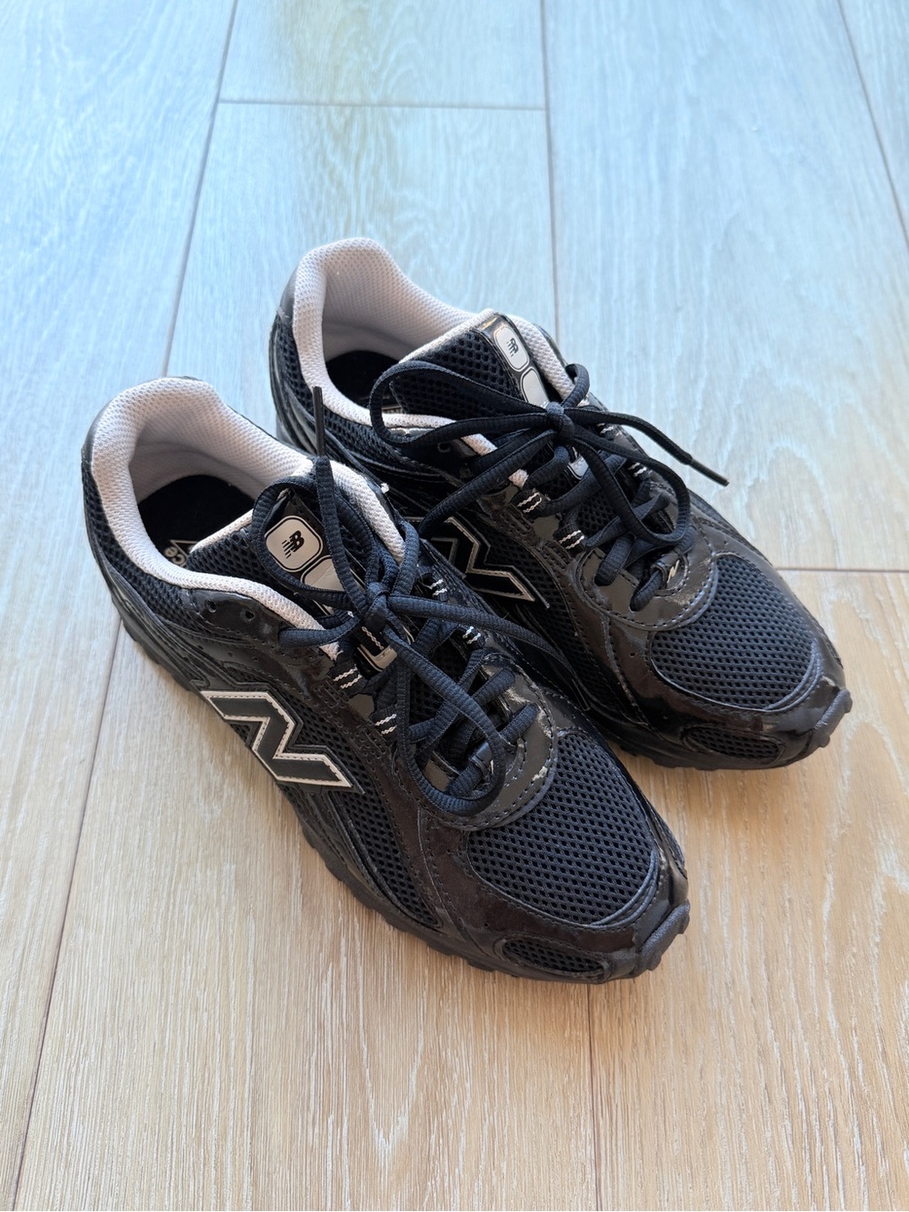 New Balance 204L Black Athletic Running Shoes in BLACK with TIMBERWOLF